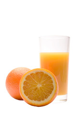 Fresh sliced orange with glass of orange juice taken against white background