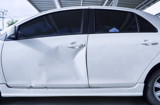 White Car Body Get Damage on the door.With Color Filter, Selective Focus 