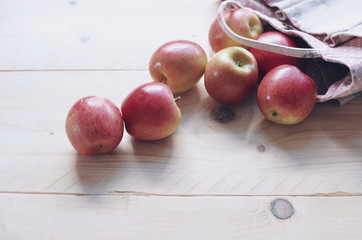 Raw food, Apple on the wood table selective focus and color filter