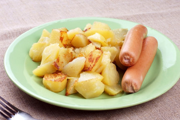 fried potatoes and sausages