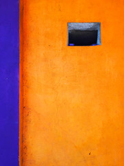 Blue and orange wall in goan house