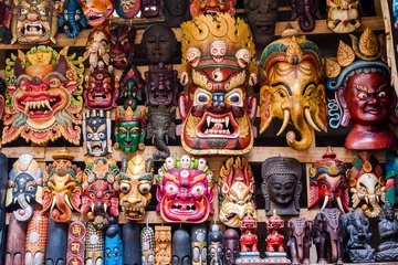 Poster Colourful masks at street market in Kathmandu, Nepal. © R.M. Nunes
