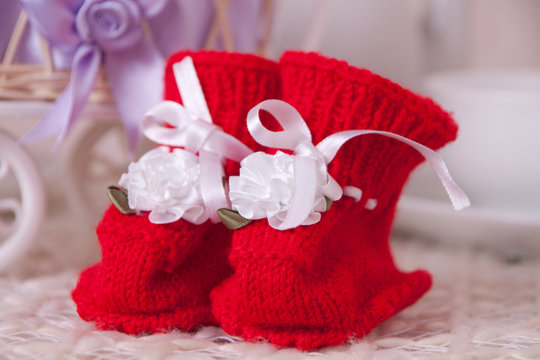 Pair of red booties