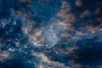 Fototapeta na wymiar Black clouds on sunset