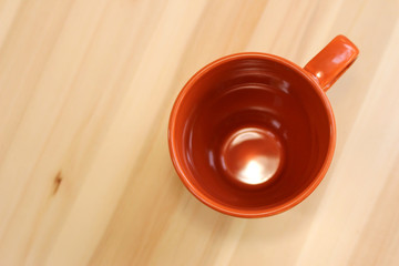 Fototapeta na wymiar Top view tea cup on wood table