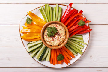 Homemade hummus with assorted fresh vegetables.