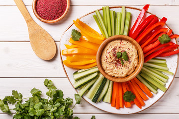 Homemade hummus with assorted fresh vegetables.