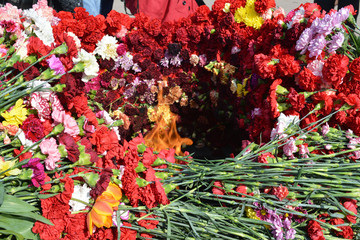 Eternal flame full of flowers