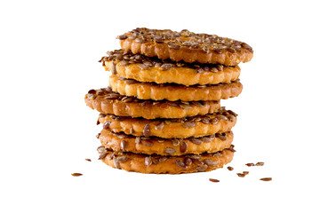 heap of cookies with flax seeds, isolate