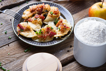 Polish fried dumplings with meat, onion and bacon.