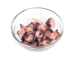 Octopus in olive oil separated on white background