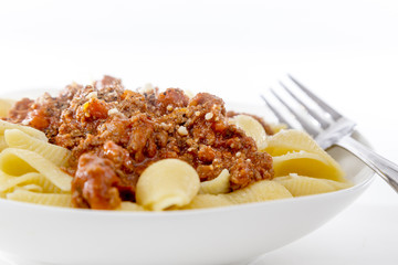 bowl of fresh pasta noodle and bolognese meat and tomato sauce i