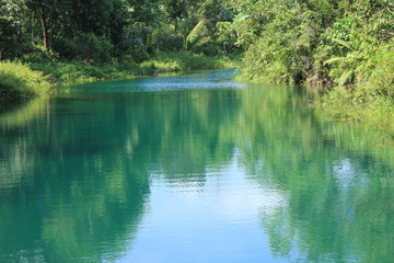 Beauty lake hidden in the nature with blue water;