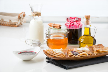 pancakes with filling on a white background