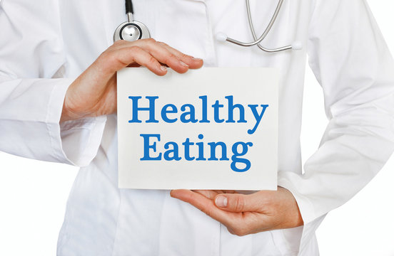 Healthy Eating card in hands of Medical Doctor