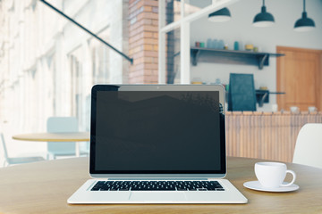 Fototapeta premium Blank laptop and coffee