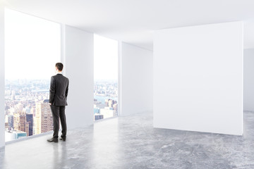 Fototapeta premium Interior with board and businessman