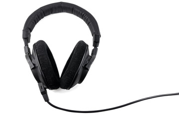 Black professional headphones isolated on white background