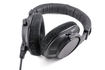 Fototapeta na wymiar Black professional headphones isolated on white background
