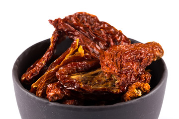 dried tomatoes on white background