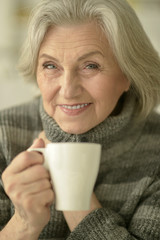 mature woman drinking tea