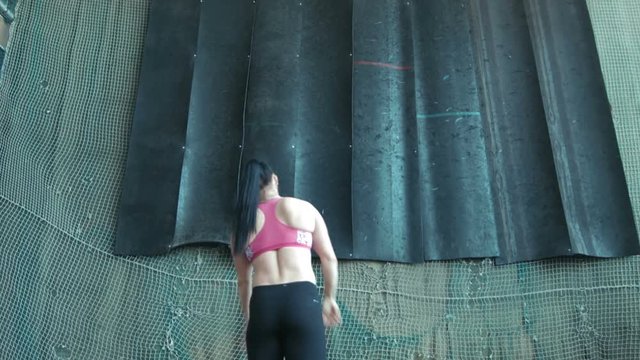 One caucasian sport female javelin, spear thrower prepares, and throw iron ball, grenade 