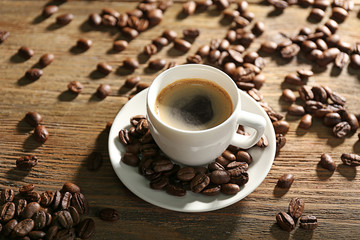 Cup of coffee on wooden table