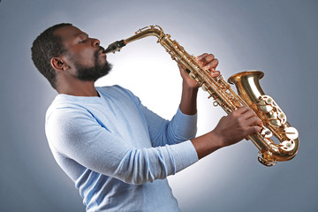 African American jazz musician playing the saxophone