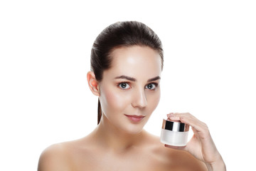 Beauty portrait of pretty girl with natural makeup hold face cream. Commercial photo for promotion cosmetic. Youth and skin care concept. Anti-age, day, night cream for young skin - 107014420