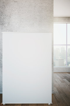 Whiteboard leaning on wall