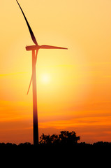 Wind turbine at sunset