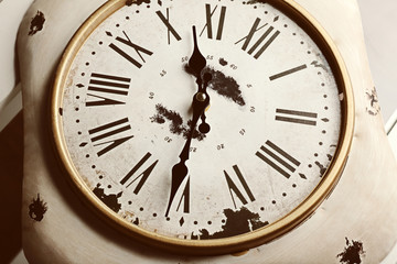 Fototapeta na wymiar Round vintage wall clock, close up
