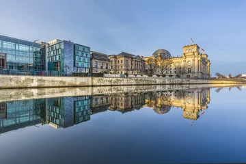 Deurstickers Reichstag with reflection in river Spree © travelview