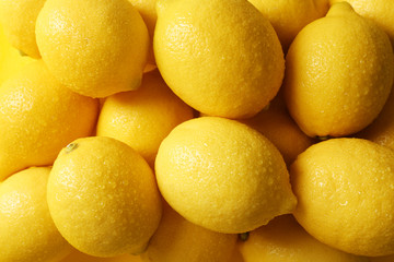 Wet lemons as background