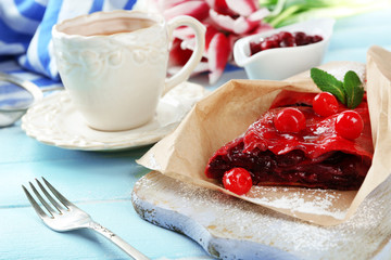 Cherry strudel with mint and cup of tea