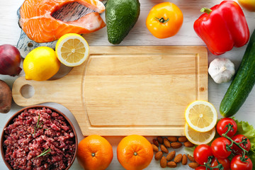 Diet food on a light wooden background