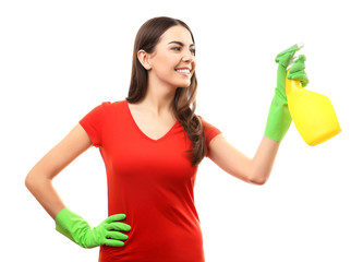 Young woman holding detergent spray, isolated on white