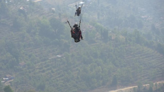 Paraglider takeoff and climb