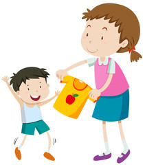 Mom helping little boy getting dress