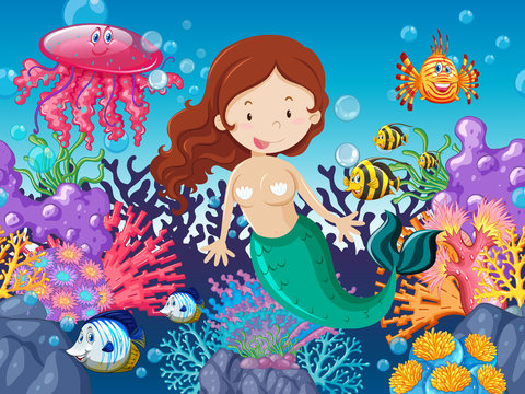 Mermaid and fish swimming under the sea