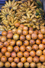 Oranges and banana, indonesian market stall