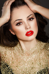 Beauty woman red lips long curly hair brunette