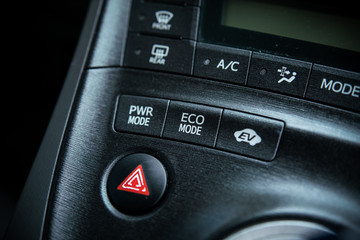 Buttons of Eco mode in hybrid cars