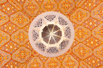 Moroccan ceiling lamp with traditional design on the colorful ceiling