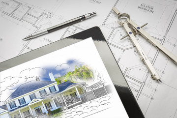 Computer Tablet Showing House Illustration On House Plans, Pencil and Compass.