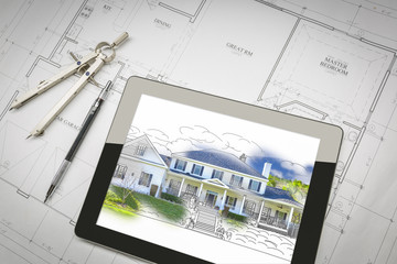 Computer Tablet Showing House Illustration On House Plans, Pencil and Compass