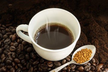 Cup of Black Coffee with Coffee Beans