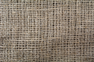 Knitted linen textile background, macro shot