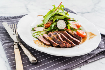 steak with salad