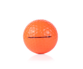 Orange golfball isolated on white background